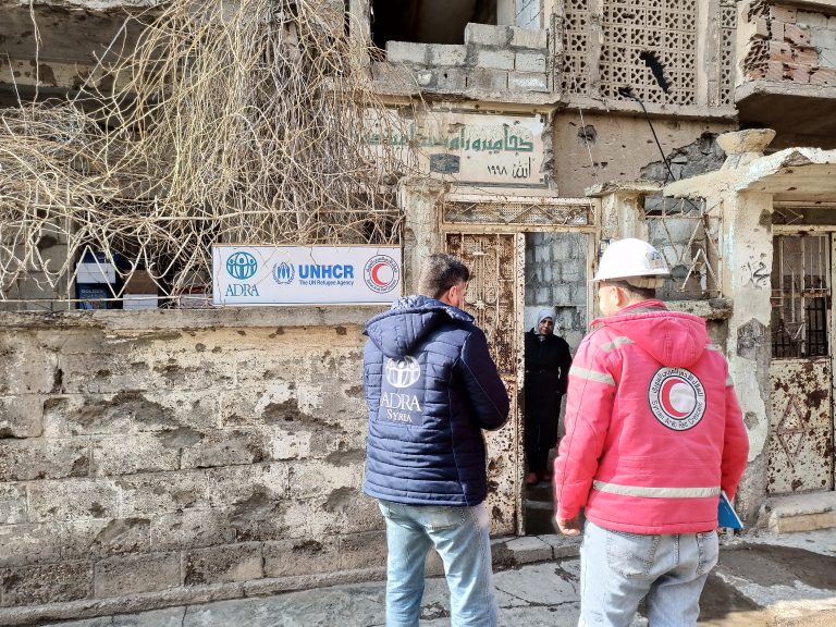 An ADRA team, in coordination with the Deir ez-Zor Governate Commitee and the Syrian Arab Red Crescent (SARC), conducting door to door visits to assess the structural integrity of damaged living spaces in Deir ez-Zor